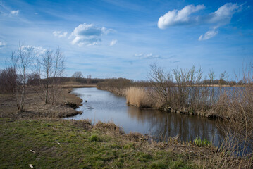 Beautiful clouds and calm water of the canal and lakes