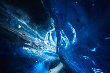 Landscape of amazing blue glacial ice cave