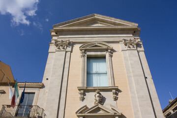 Fototapeta na wymiar Old beautiful palace on Ortigia island in Syracuse, Sicily, Italy