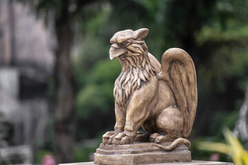 Gargoyle statue, chimeras, in the form of medieval winged monster, from the royal castle in Bana hill, Da Nang, Vietnam