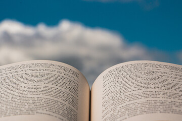book with the sky as the background