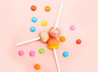Colorful candies isolated on colored background