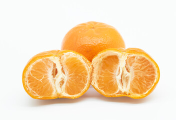 Isolated citrus collection. Whole tangerines or mandarin orange fruits and peeled segments isolated on white background