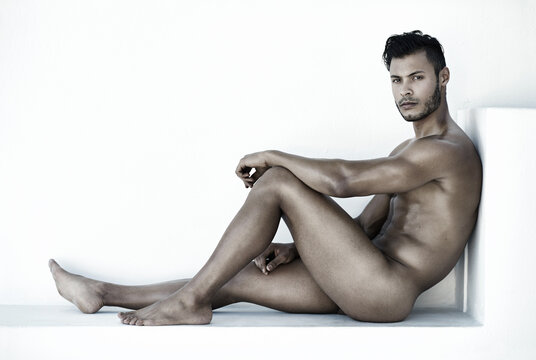 Moment to myself. Shot of a handsome young man posing nude.