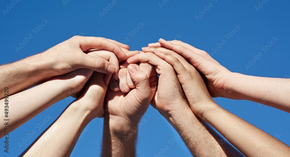 Poster Supporting each other. Cropped shot of a group of hands holding on to each other.