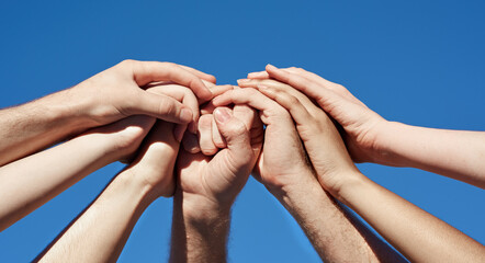 Supporting each other. Cropped shot of a group of hands holding on to each other.