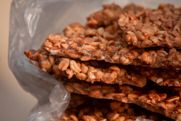 Traditional street food peanut Chikki or Kotkoti