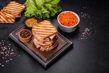 Delicious fresh toast grill with cheese and ham. Sandwiches, quick snack