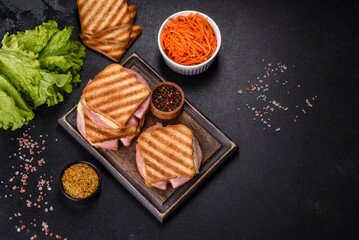 Delicious fresh toast grill with cheese and ham. Sandwiches, quick snack