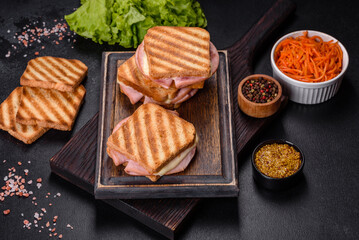 Delicious fresh toast grill with cheese and ham. Sandwiches, quick snack