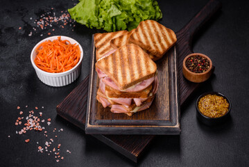 Delicious fresh toast grill with cheese and ham. Sandwiches, quick snack