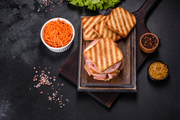 Delicious fresh toast grill with cheese and ham. Sandwiches, quick snack