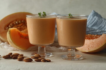 Muskmelon smoothie. A milk shake prepared with muskmelon cubes and almonds