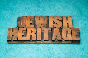 Jewish heritage - word abstract in vintage letterpress wood type against blue textured bark paper,...