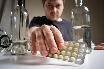 A man keeps hangover pills, alcohol treatment, alcohol dependence
