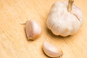 Garlic on a wooden background