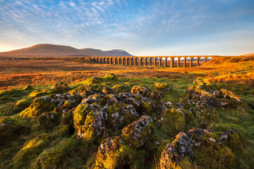 Wide angle view of Ribblehead Viaduct on a beautiful sunny morning. Yorkshire Dales National Park, UK.
