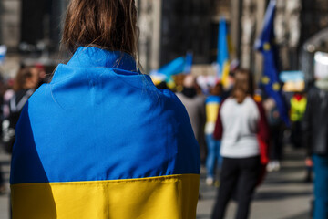 flags and symbols at a peaceful protest in defense of Ukraine