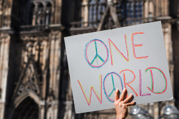 flags and symbols at a peaceful protest in defense of Ukraine