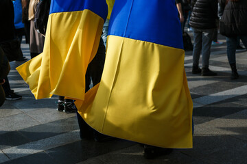 flags and symbols at a peaceful protest in defense of Ukraine