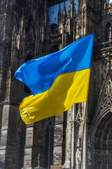 flags and symbols at a peaceful protest in defense of Ukraine