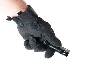 Male hand holding  the black gloves holding flash light.