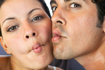 Couple making a fish face with lips