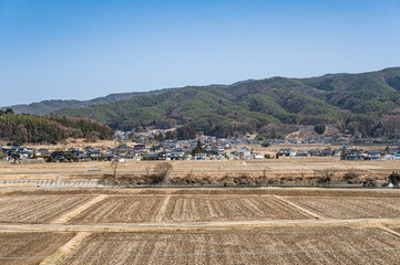 Fototapeta premium 早春の田舎の風景 辰野町