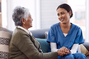 Im here to lend my support whenever you need. Shot of a young nurse chatting to a senior woman in a...