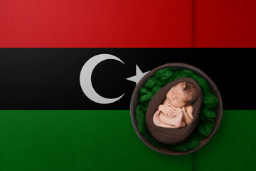 Newborn portrait on background in color of national flag. Patriotic photography concept. Libyan Arab Jamahiriya