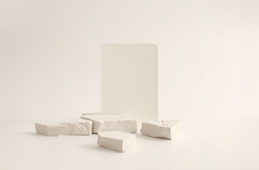 Texture stone platform eco podium and empty card on gray beige copy space background. Minimal still...