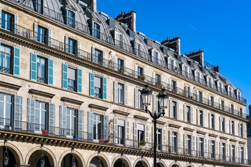 Fototapeta premium Paris, rue de Rivoli, typical windows, parisian facade 