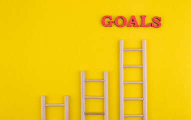 Career ladder concept with wooden stairs