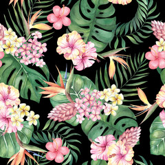 Tropical watercolor seamless pattern with flowers and leaves on a black background.
