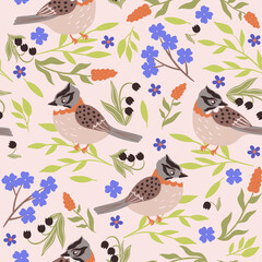 Seamless pattern with birds and flowers. Vector graphics.