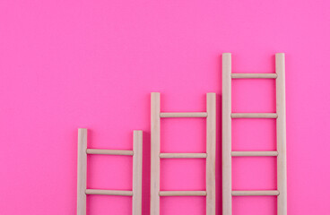 Career ladder concept with wooden stairs