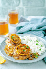 Maroccan lemon chicken with rice in a plate