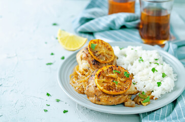 Maroccan lemon chicken with rice in a plate