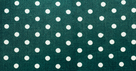 green fabric with white polka dots background - obrazy, fototapety, plakaty
