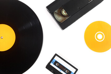 Vinyl record, cd, audio and video cassettes top view	