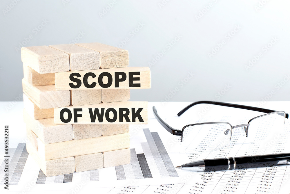 Poster scope of work is written on wooden blocks on a chart background