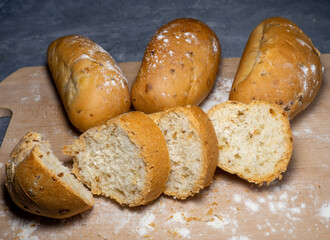 Buns stuffed with onions. Lush flour products. Hearty food.  At the bakery. cut wheat flour bun