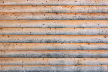 Weathered wooden background made of plain planks