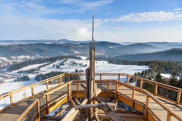 Mountain winter landscape seen from wooden path of observation tower