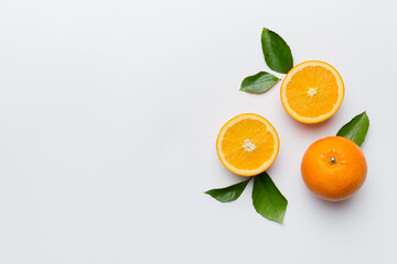 fresh Fruit orange slices on colored background. Top view. Copy Space. creative summer concept. Half of citrus in minimal flat lay with copy space