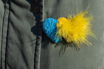 Brooch Ukraine flag color - light blue and yellow. Two hearts, homemade from beads and feathers....