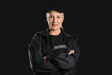Obraz premium Female security guard on dark background