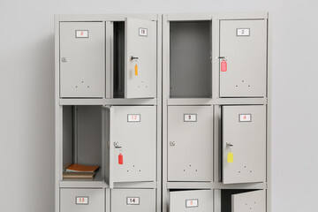 Modern locker near light wall