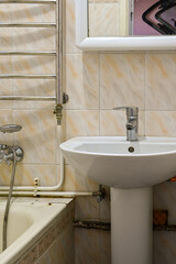 Apartment Bathroom with old antique fixtures. old soviet bathroom.