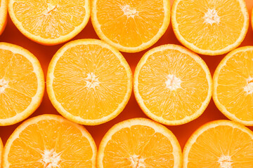 Slices of juicy orange as background, closeup
